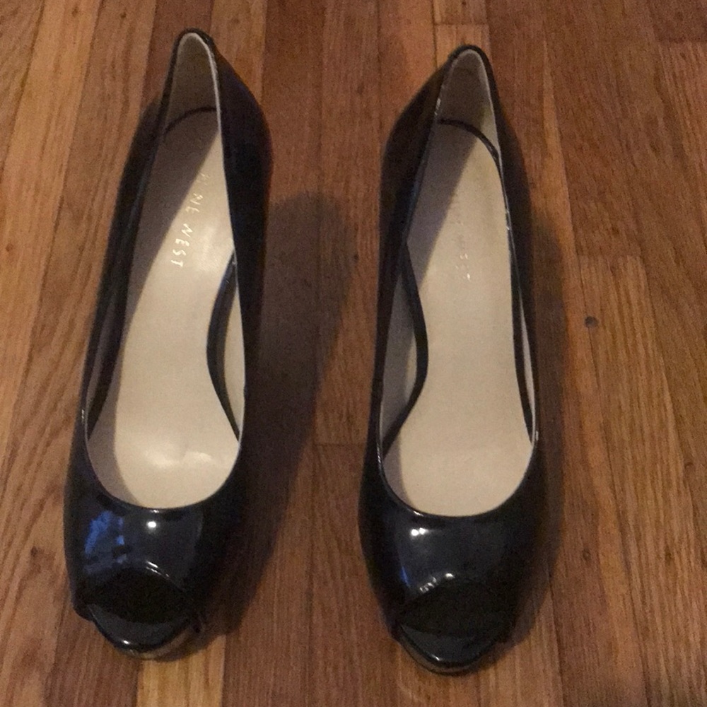 Nine West black patent peep toe pumps